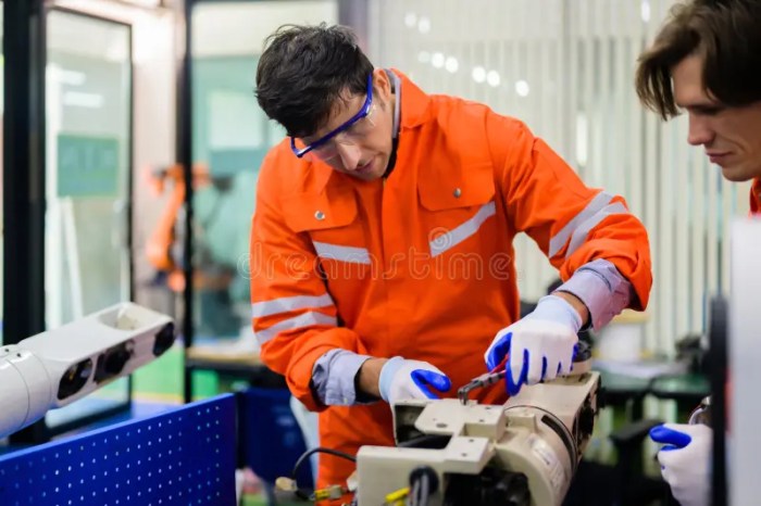 Professional Technicians Team Checking Parts of Automatic Robotic ...